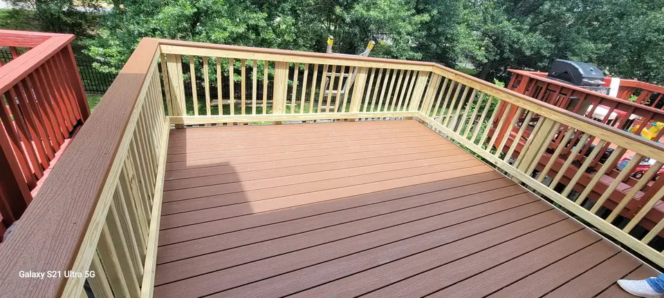 Deck resurfaced with new decking and repaired handrails