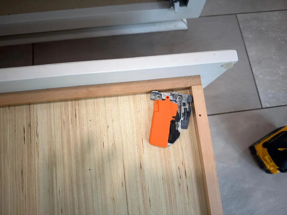 Opposite drawer corner showing the slide-release fitting