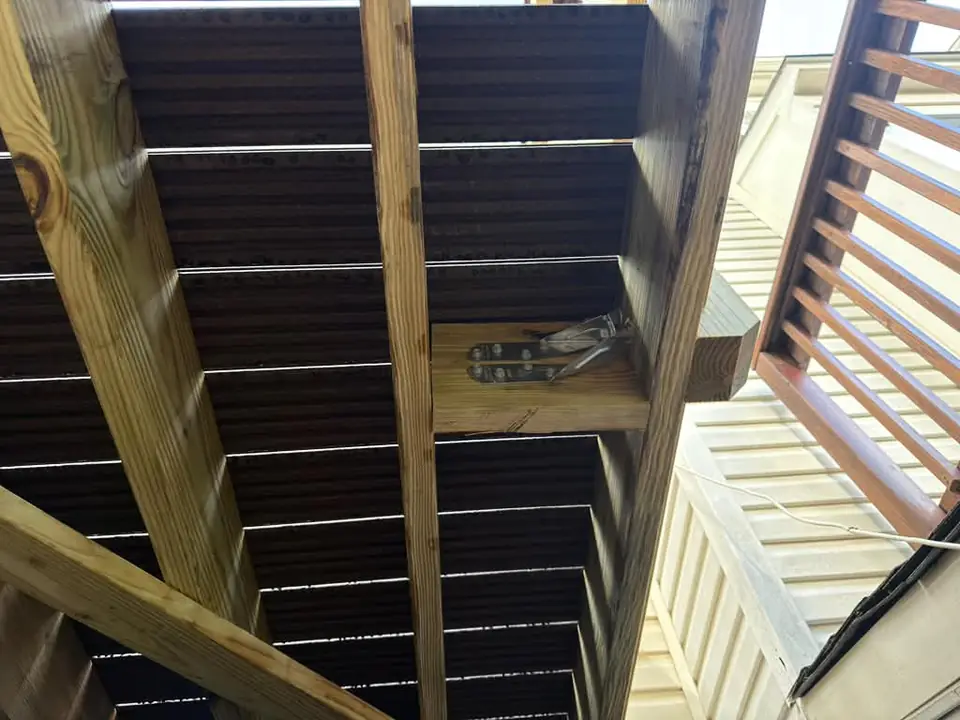 Connection hardware and joists beneath the raised deck