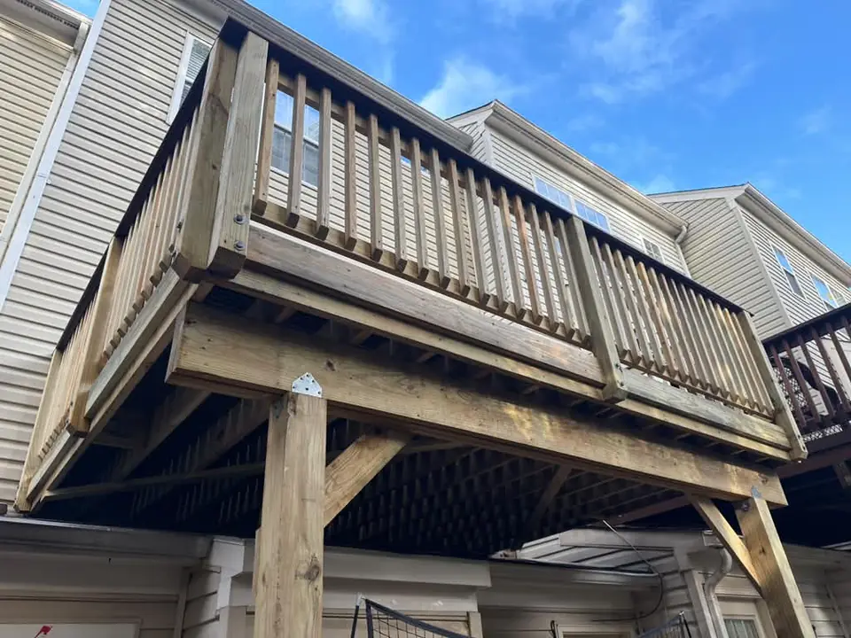 Raised deck, posts and railings viewed from below