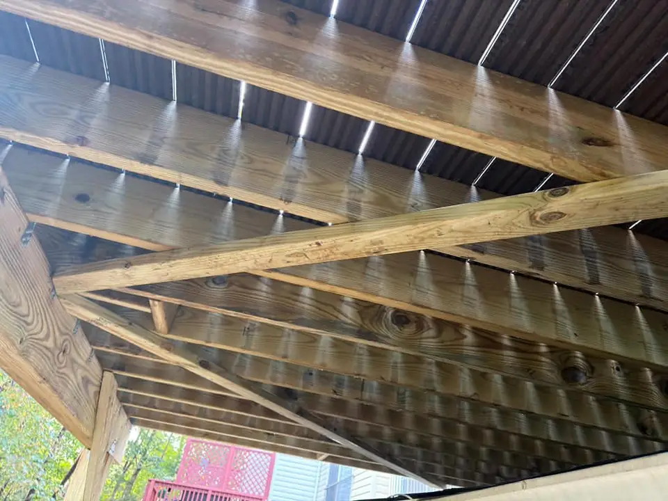 Deck joists and diagonal bracing beneath the deck boards