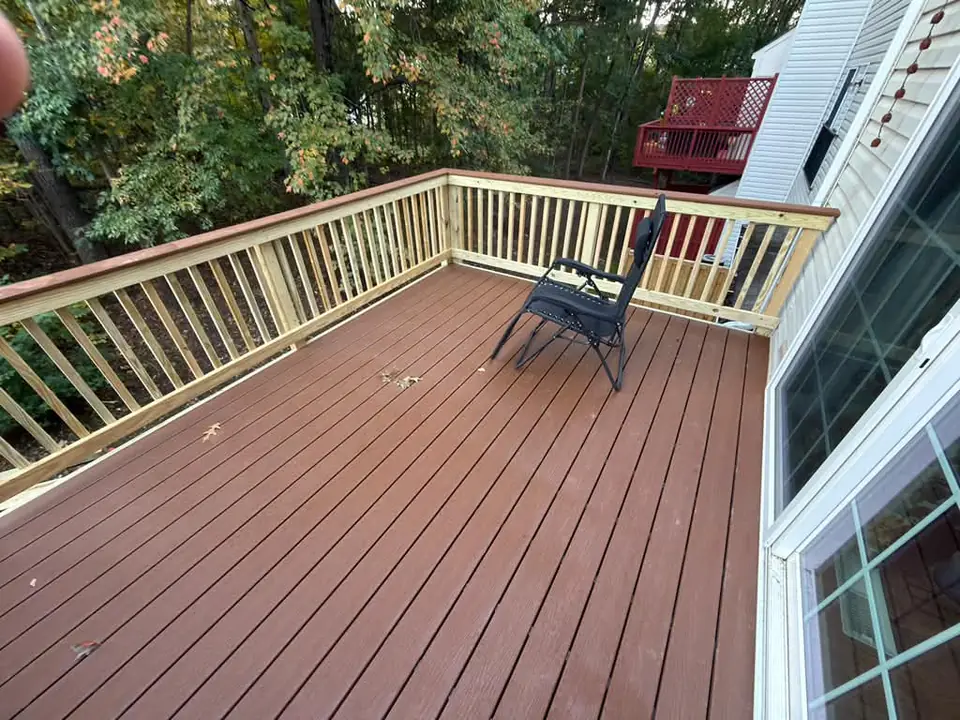 Wide view across the new deck and wood railings