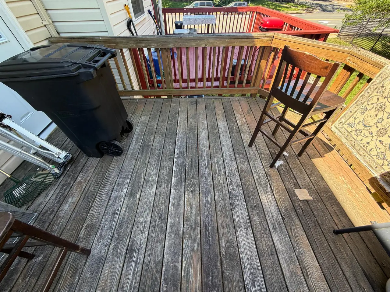 Old deck boards and railing before the rebuild