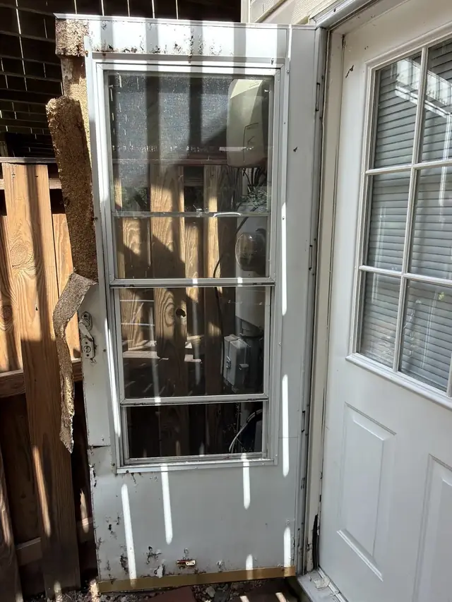 Storm door replacement before work